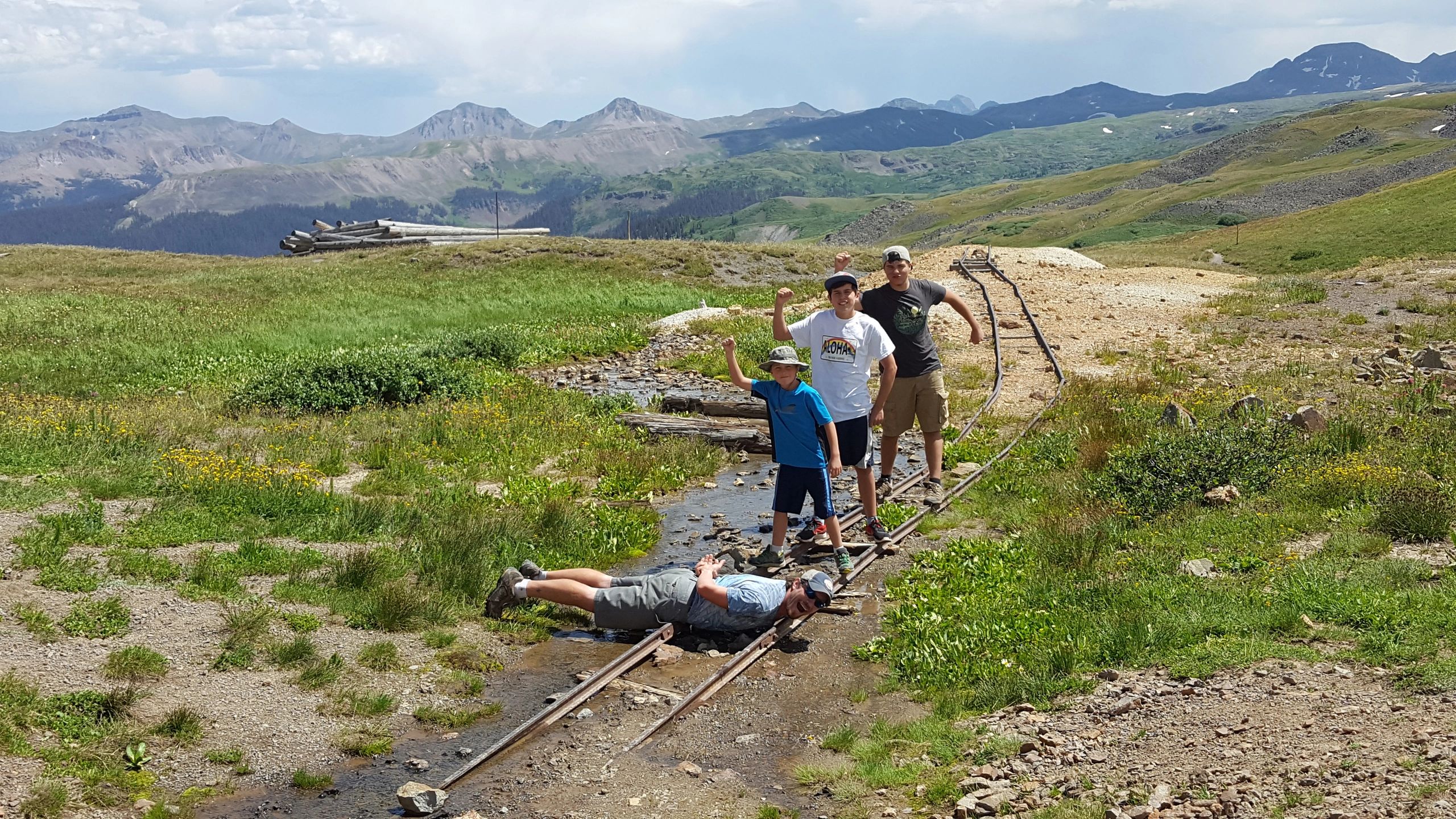 Group on Four Corners mountain railway tracks